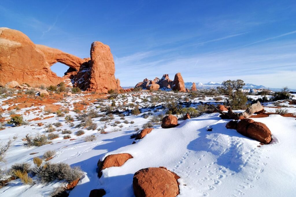 Snow-covered hoodoos at National Park during a peaceful winter morning in Utah.