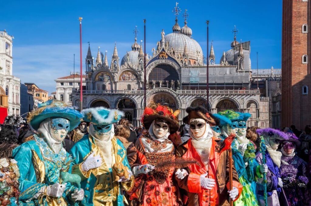 People wearing elegant masks during the Carnival of Venice in Italy